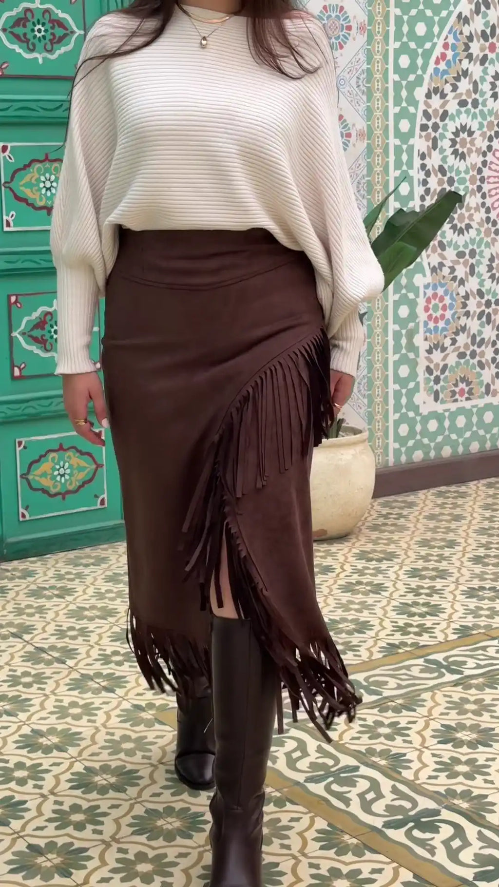 Brown suede fringe skirt with side fringe detail and flowing movement